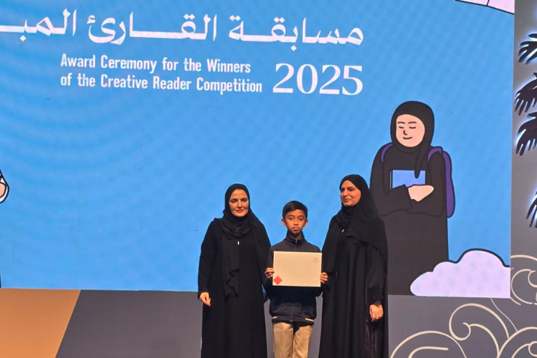 ICS Al Manhal student honoured on stage during Creative Reader Competition ceremony