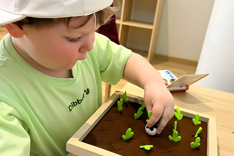Young student at Dibber nursery participating in fine motor skill development activity