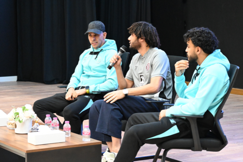 Mohamed Elneny speaks during a Q&A session alongside Al Jazira Club players at ICS Al Danah.