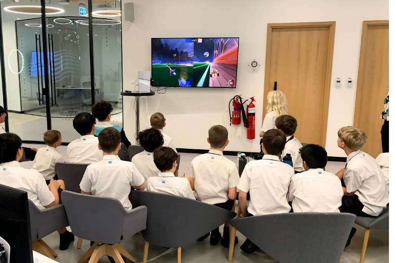Students watching Rocket League esports match