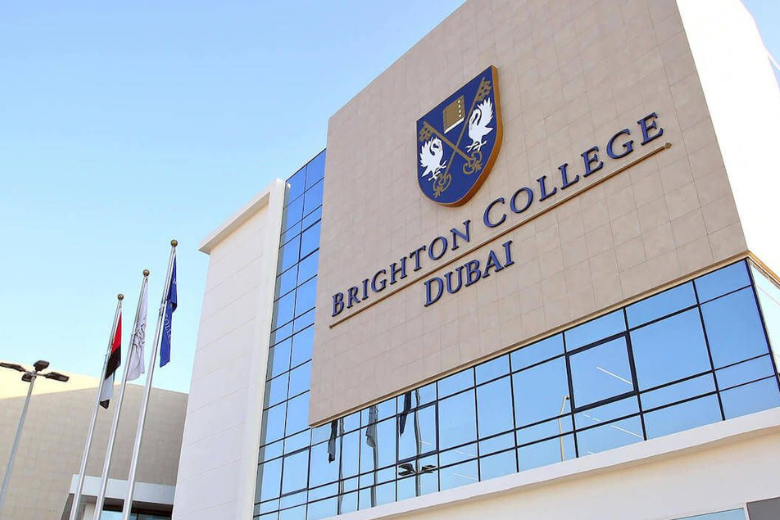 Brighton College Dubai campus exterior showcasing school signage and modern facilities.