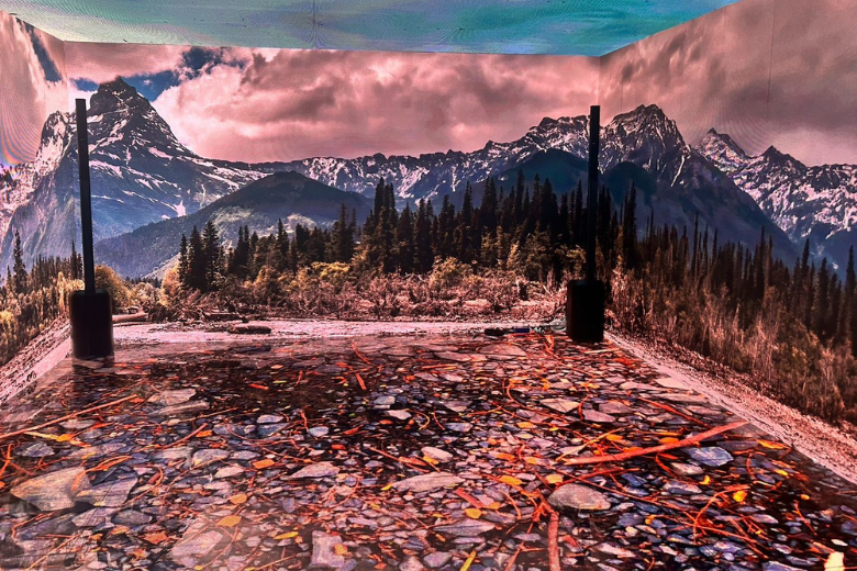 A calming immersive classroom at ESTARS featuring a mountain lake and forest projection for mindfulness learning.