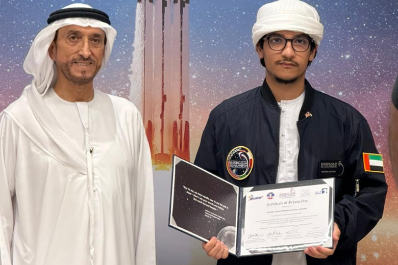 ICS student Hamdan Alshehhi receiving certificate at the Astronaut Al Worden Endeavour Scholarship ceremony in the USA.