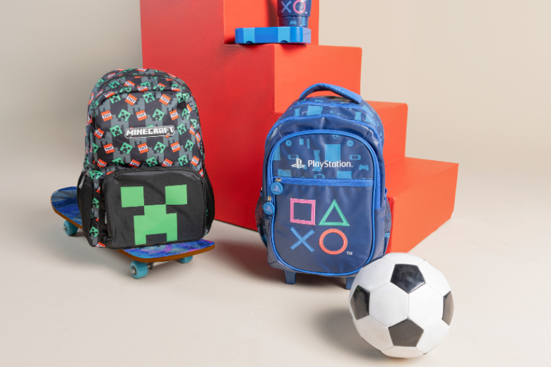 Babyshop character backpacks featuring Minecraft and PlayStation designs with football and skateboard