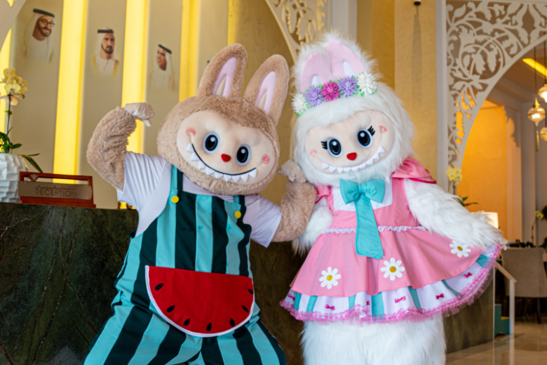 Life-sized Labubu dolls greeting guests in the lobby of Rixos Bab Al Bahr.