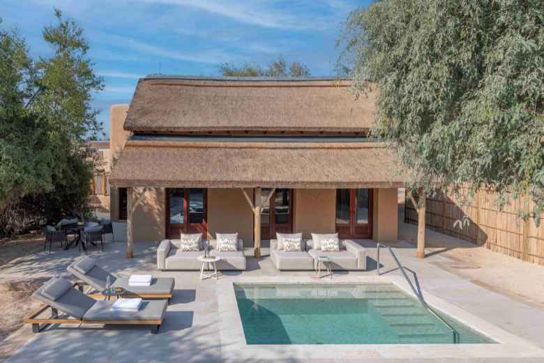 Private pool villa at Al Sahel on Anantara Sir Bani Yas Island surrounded by savannah landscape