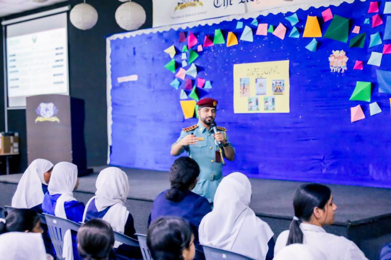 bloomington-academy-road-safety-workshop – Ajman police officer conducting road safety workshop at Bloomington Academy Ajman