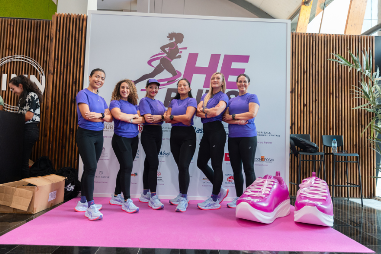 ASICS Front Runners team posing at She Runs Dubai 2025 launch in Zinn Sports City