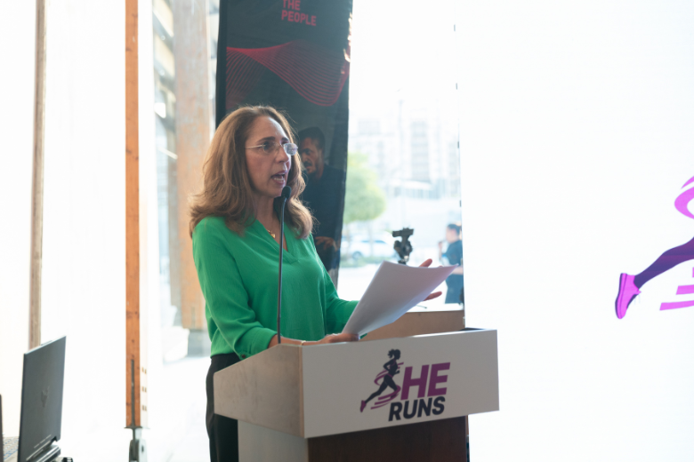 Nadia Swan delivering keynote speech at She Runs Dubai 2025 launch event