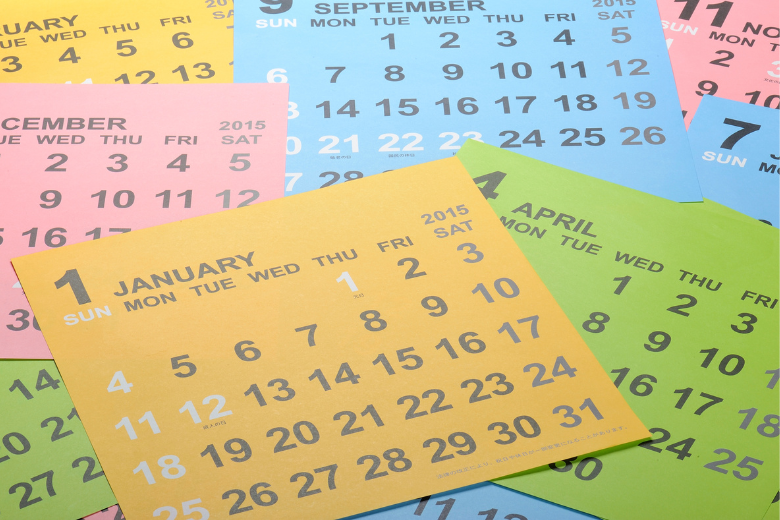 Colourful calendar pages symbolising different school schedules, reflecting how not all UAE schools will adopt the extended four-week winter break.