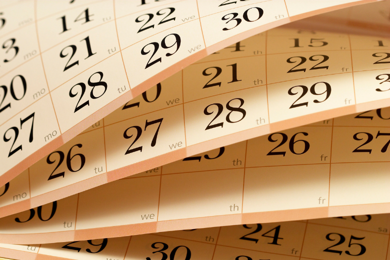 Close-up of calendar pages, representing the UAE’s new unified school calendar for 2025–26.
