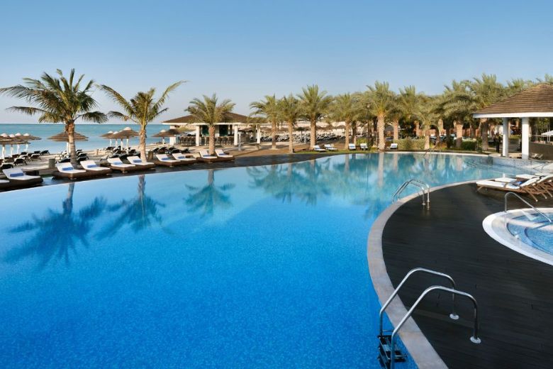 Escape to paradise with redeemable Beach Club Day Pass at Bayshore Beach Club