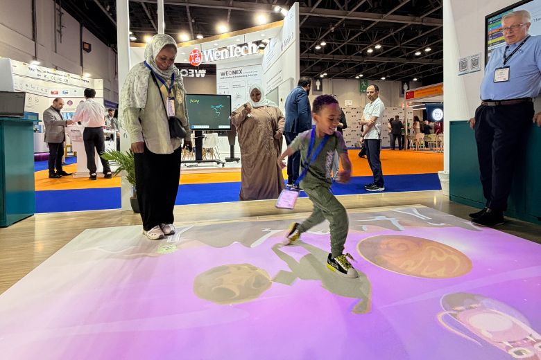 Visitors exploring BenQ smart classroom technologies
