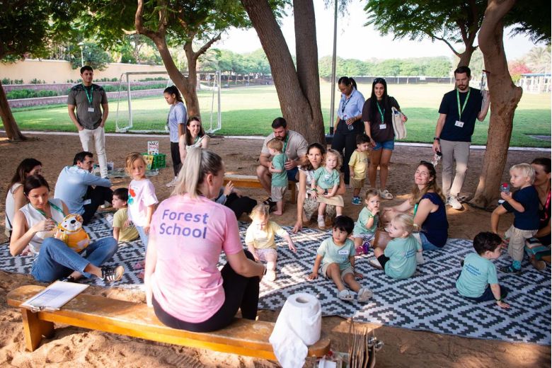 Young pupils exploring outdoor sensory activities at Jumeirah International Nurseries