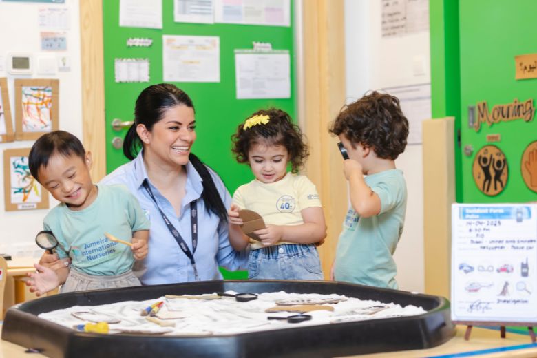 Teachers supporting young learners at Jumeirah International Nurseries