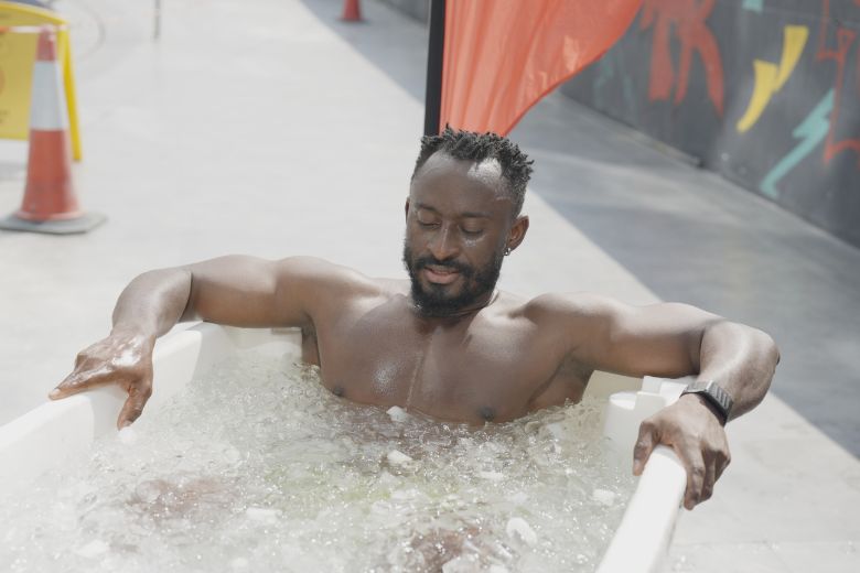 People enjoying a recovery session with ice baths after an intense workout.