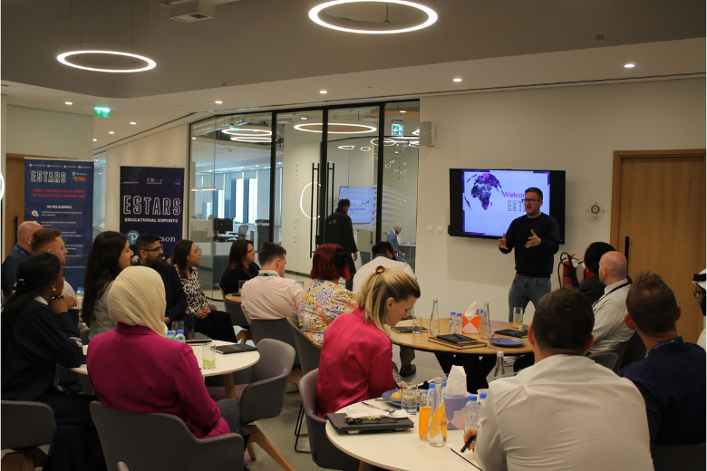 Educators attending a professional development talk introducing the EStars esports CPD course.