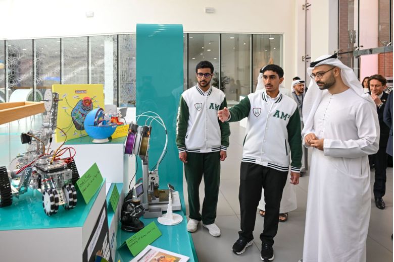 Students showcasing talents during ADEK school visit