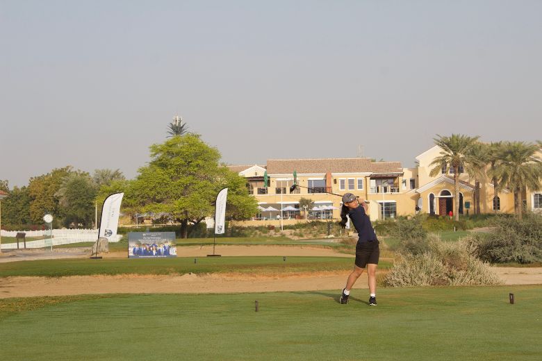 Participants playing on the course during Brighton College Dubai youth golf competition