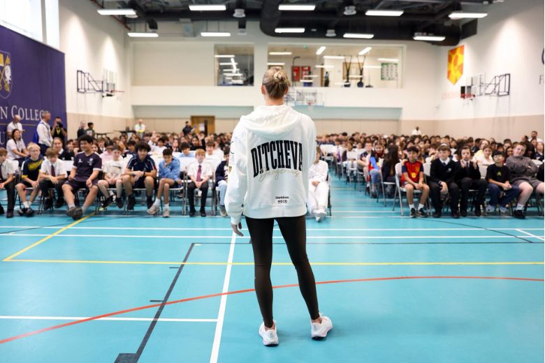 Dakota Ditcheva speaking to pupils at Brighton College Dubai during school assembly