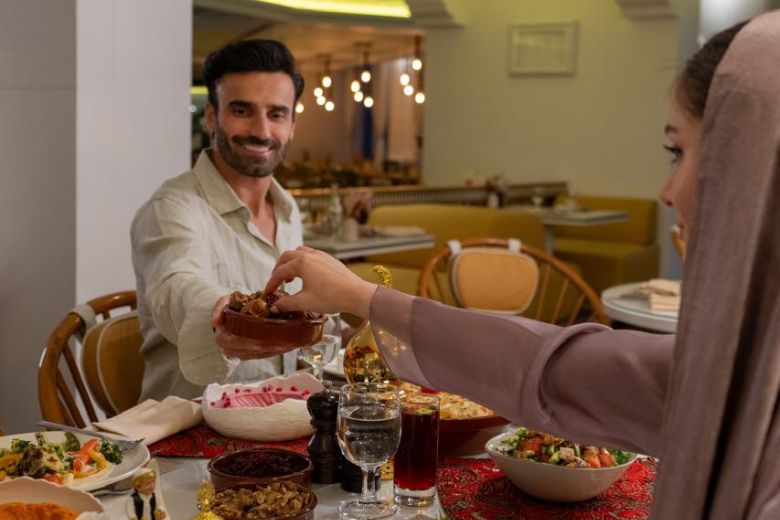Special Iftar dishes being served directly at the table