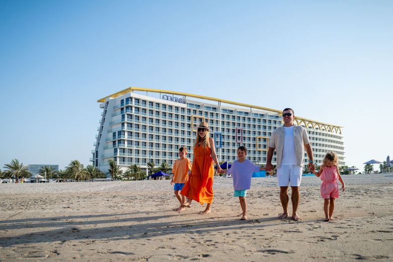 Families enjoyingbeach fun at Centara Mirage Beach Resort Dubai