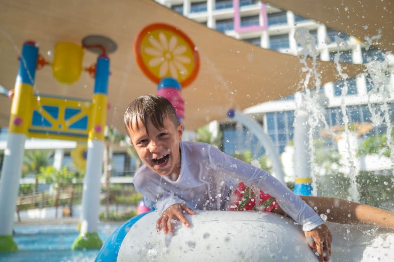 Children enjoying Spalsh pad at the Centara Mirage Beach Resort Dubai