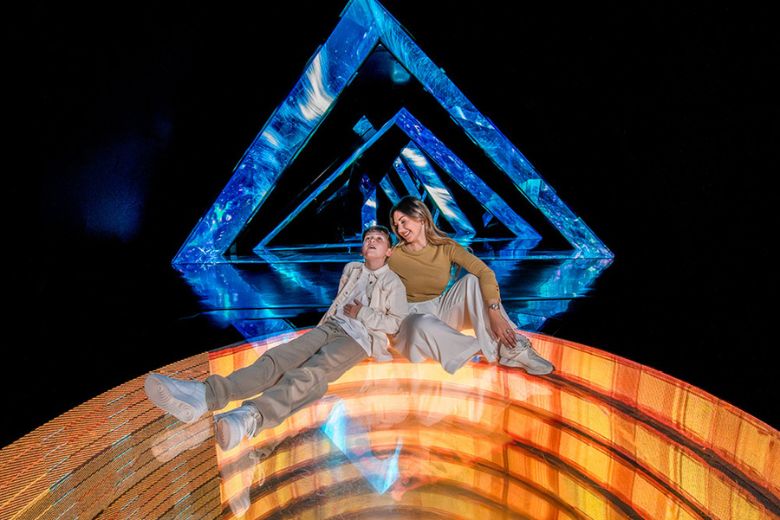 Children playing in interactive light and sound installations Dubai