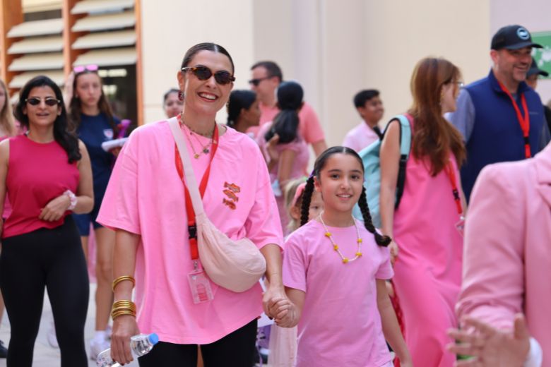 Parents participating in Pink Walk Day at Dwight School Dubai