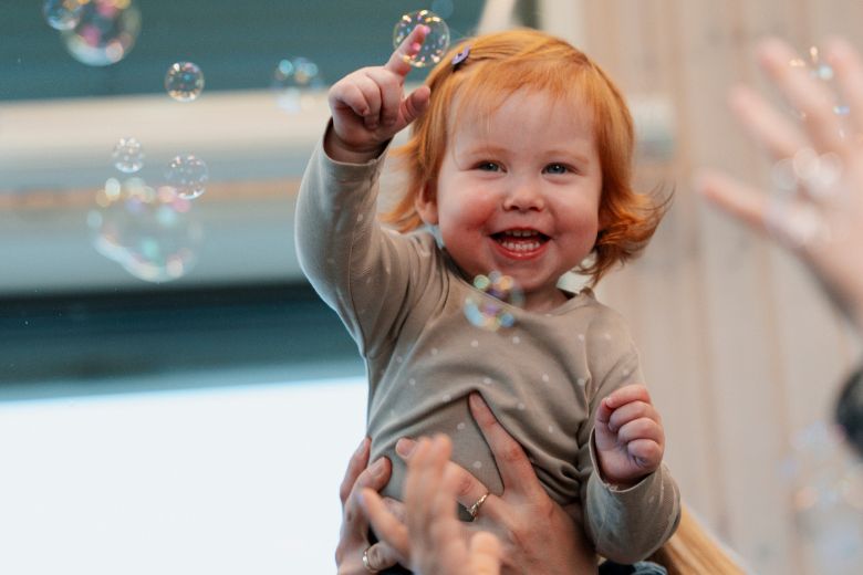 Child focusing on sensory play as part of mindfulness learning