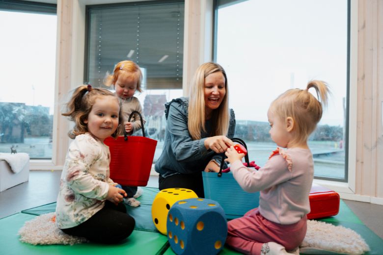 Preschool children engaging in mindfulness activities with teacher guidance