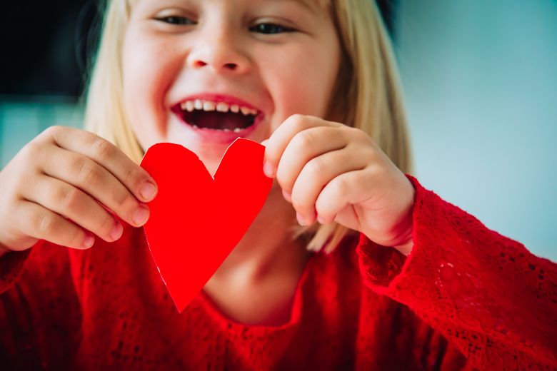 Child focusing on sensory play as part of mindfulness learning