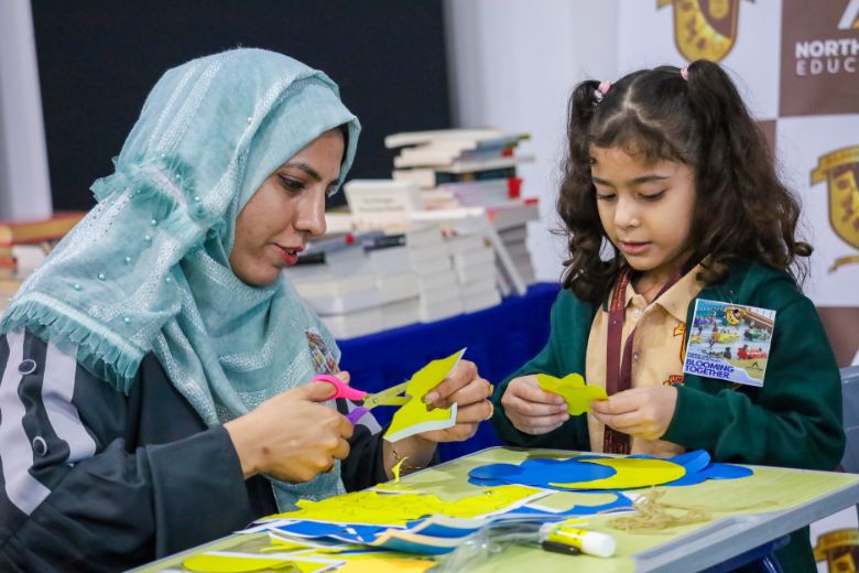 Parents involved in activities with children during 'Family Days'
