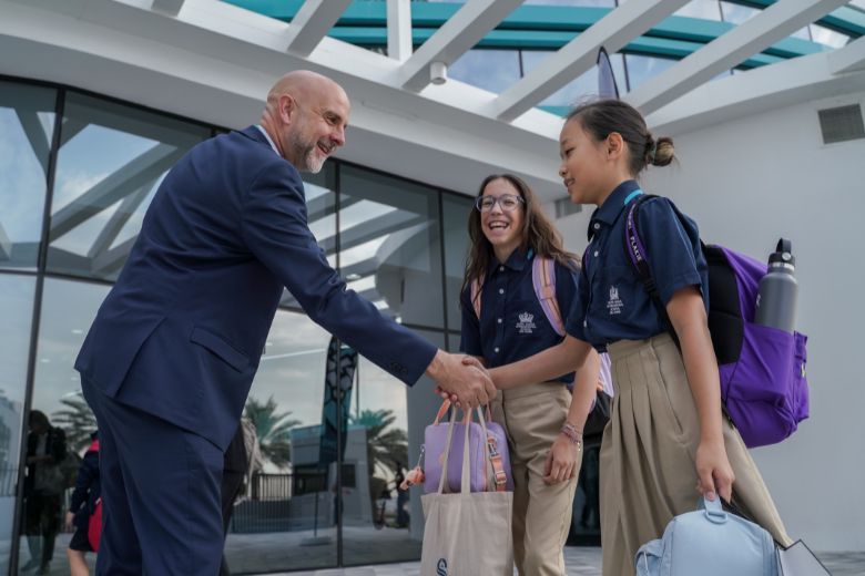 Principal, Liam Cullinan of Nord Anglia International School Abu Dhabi greeting students