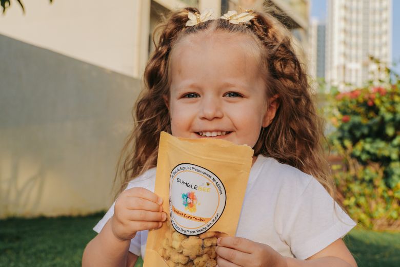 Child enjoying nutritious bone broth cookies designed for kids in the UAE