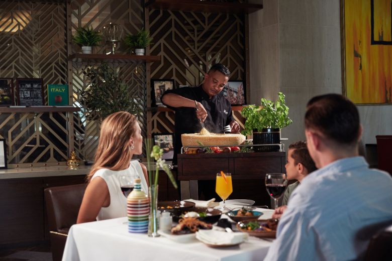 Family dining at Gioia restaurant Fairmont Ajman