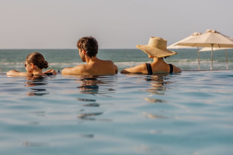 Family enjoying beachfront at Fairmont Ajman