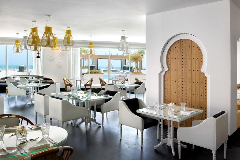 Elegant dining hall interior at Fairmont Fujairah Beach Resort with modern design