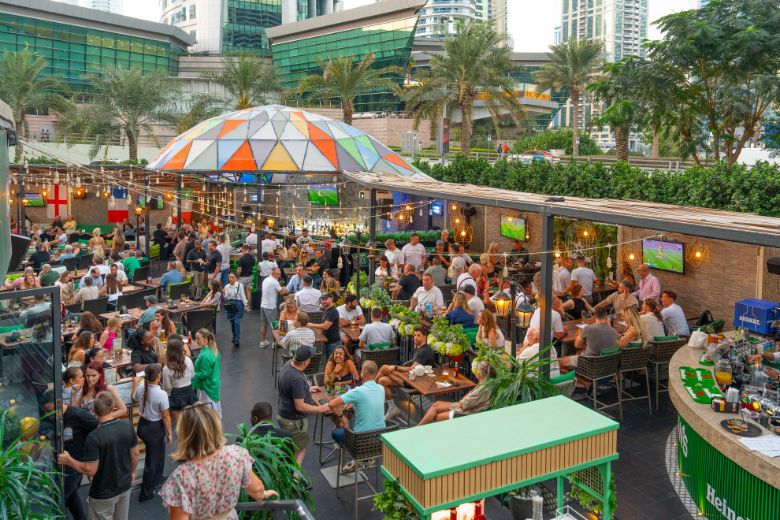 Guests soak up the lively atmosphere at McGettigan’s, a popular Irish pub destination in Dubai known for food, drinks and social gatherings