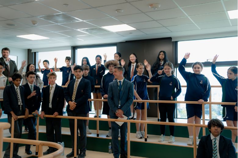 Students participating in academic society discussions at Royal Grammar School Guildford Dubai