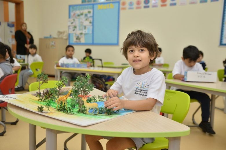 Students engaged in collaborative learning that encourages confidence and curiosity