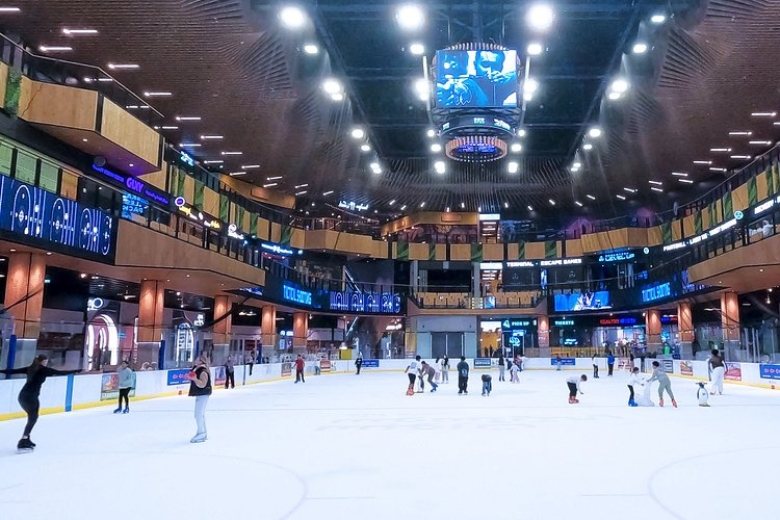 he Sports City ice rink provides affordable family fun away from the summer heat