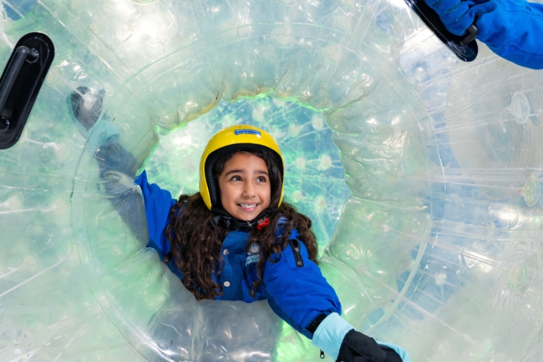 Children explore the snow park attractions at Snow Abu Dhabi