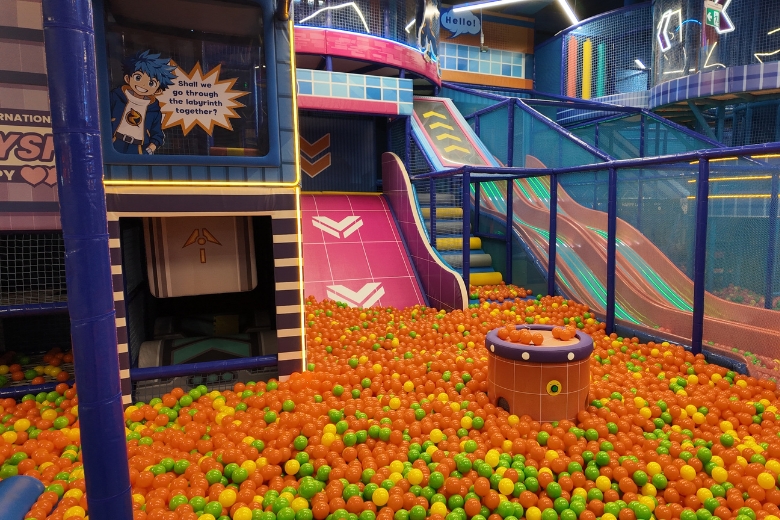 Children dive into a colourful world of play in Zamania's massive ball pit